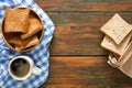 Breakfast background, toast and coffee on rustic wood, top view Royalty Free Stock Photo