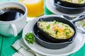 Breakfast - baked avocado with eggs, coffee and juice