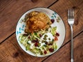 Breakfast with baked chicken and vegetable salad with pumpkin seeds