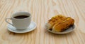 Breakfast with Baker Vietnamese or Viet Nam bread and black coffee on wooden retro background. Royalty Free Stock Photo