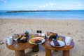 breakfast on the beach, breakfast setting on a tropical beach in Mauritius Royalty Free Stock Photo