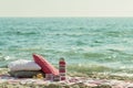 Breakfast on the beach. Coffee and croissants on the sea. Pillow