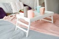 Breakfast in bed. Bedroom in pastel colors