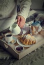 Breakfast in bed - coffee, croissant, milk on tray Royalty Free Stock Photo