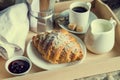 Breakfast in bed - coffee, croissant, milk on tray Royalty Free Stock Photo