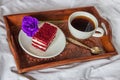 Breakfast in bed. Cup, coffee, red, velvet, cake and flower Royalty Free Stock Photo