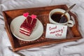 Breakfast in bed. Cup, coffee, red, velvet, cake and note with t Royalty Free Stock Photo
