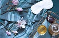 Breakfast in bed flat lay with magnolia flowers and green tea with marshmallows. Tea break concept. Royalty Free Stock Photo