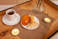 Breakfast in bed, flowers, tea and buns, beautiful food, candles. Dinner in the bedroom. New Year`s sides, lights. Christmas