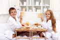Breakfast in bed with happy kids Royalty Free Stock Photo