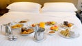 Breakfast in bed in hotel. Room service in modern luxury resort Royalty Free Stock Photo