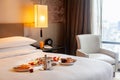 Breakfast in bed in hotel. Room service in modern luxury resort Royalty Free Stock Photo