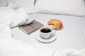 Breakfast in bed and time for writing in a diary Royalty Free Stock Photo