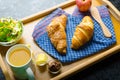 Breakfast in bed on wood tray