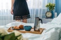 Breakfast in bed for young beautiful woman Royalty Free Stock Photo