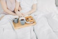 Breakfast in bed , yummy home made cake with a cup of coffee. Royalty Free Stock Photo