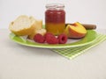 Breakfast with bicolor peach and raspberry jam Royalty Free Stock Photo