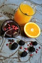 Breakfast with blackberries ,goji seeds and orange juice