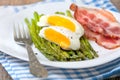 Breakfast: boiled egg, baked asparagus Royalty Free Stock Photo