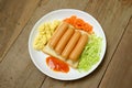 Breakfast with bread egg sausage and vegetables Royalty Free Stock Photo