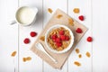 Breakfast with brown rice flakes, milk and fresh raspberries Royalty Free Stock Photo