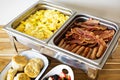 Breakfast buffet with scrambled eggs and bacon