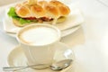 Breakfast with cappuccino and tuna sandwich Royalty Free Stock Photo