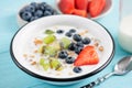 Breakfast cereals with almond milk and fruits in a bowl Royalty Free Stock Photo