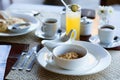 Breakfast with cereals, milk, fruit juice and coffee Royalty Free Stock Photo