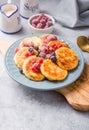 Breakfast with cheesecake, fresh berries . Cottage cheese pancakes or curd fritters. Russian syrniki or sirniki