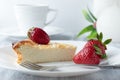 Breakfast with cheesecake, strawberries and a cup of tea