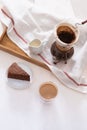 Breakfast with chocolate cake and coffee served on a beautiful living home Royalty Free Stock Photo