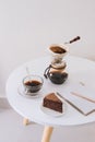 Breakfast with chocolate cake and coffee served on a beautiful living home Royalty Free Stock Photo