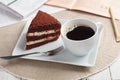 Breakfast with chocolate cake and coffee Royalty Free Stock Photo