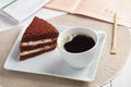 Breakfast with chocolate cake and coffee Royalty Free Stock Photo