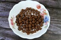 Breakfast Chocolate flavored balls cereal, as a snack prepared with milk for children and adults, crispy crunchy chocolate Royalty Free Stock Photo