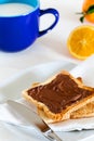 Breakfast with Chocolate Spread on Toast Royalty Free Stock Photo
