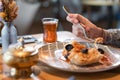 Breakfast closeup, oatmeal with salted caramel and prunes, in the original serving. Breakfast, pleasant morning, the