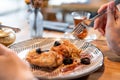 Breakfast closeup, oatmeal with salted caramel and prunes, in the original serving. Breakfast, pleasant morning, the