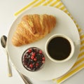 Breakfast, coffee and croissants with berry jam on white table. French croissant. Fresh buns meal, snack. Isoalted with copy space Royalty Free Stock Photo