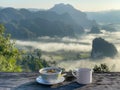 Breakfast and coffee and  in the mountains view. Perfect breakfast in mountains. Coffee and boiled rice in morning on mountain vie Royalty Free Stock Photo