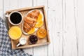 Breakfast with coffee, orange juice jam and fresh croissant Royalty Free Stock Photo