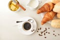 Breakfast with coffee and pastries on a white table top Royalty Free Stock Photo