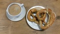 Breakfast with coffee and pretzels