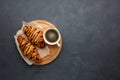 Breakfast - coffee and sweet croissant with chocolate.