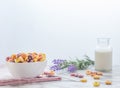 Breakfast of colorful cereals and milk ready to drink Royalty Free Stock Photo