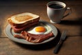Breakfast composition with toast, bacon, eggs and a cup of coffee. American traditional breakfast.