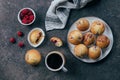 Breakfast concept. Cup of black coffee, raspberry muffins on concrete table. Top view, flat lay Royalty Free Stock Photo