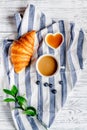 Breakfast concept with flowers on wooden background top view Royalty Free Stock Photo
