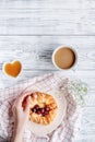 Breakfast concept with flowers on wooden background top view Royalty Free Stock Photo